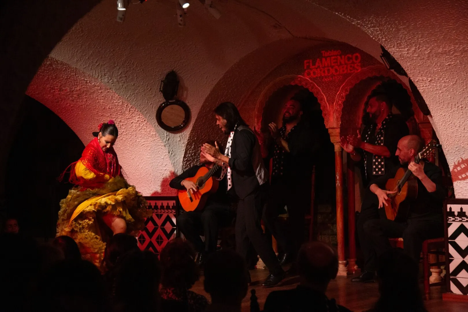 Flamenco dancers in a tablao